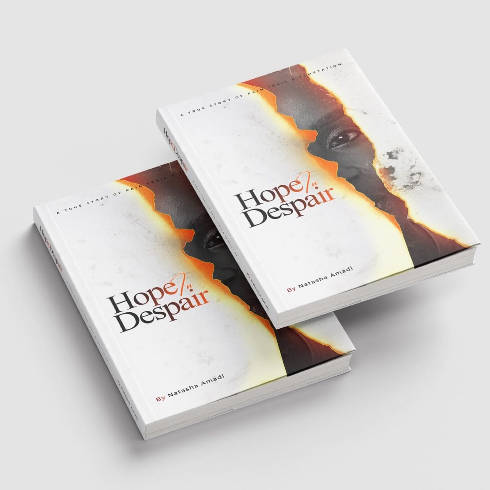 Two hardcover books titled Hope and Despair on a wooden surface